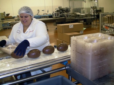 A happy egg packing Oompa Loompa