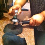 Tamping the coffee